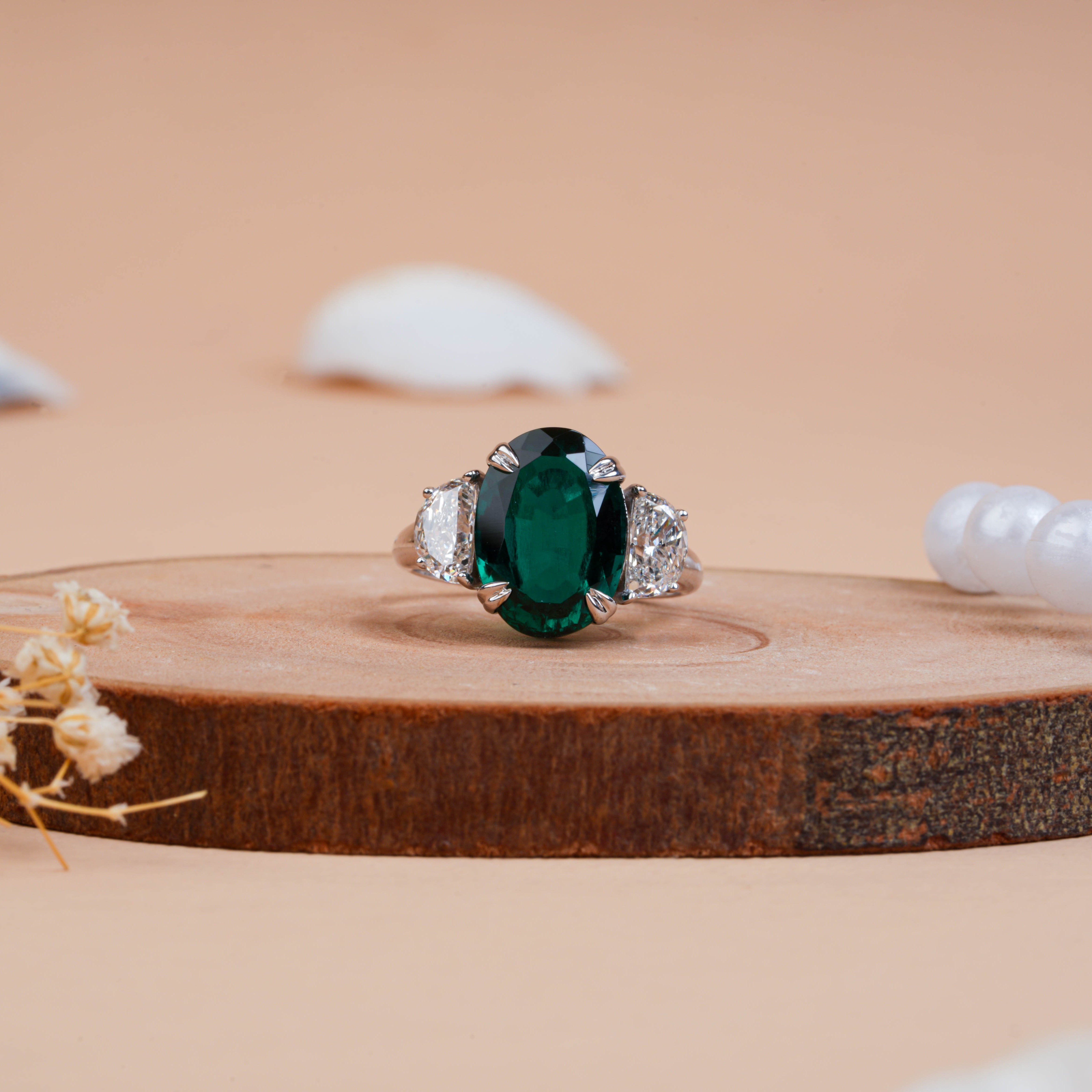 Oval Cut Emerald Lab Grown Diamond Engagement Ring