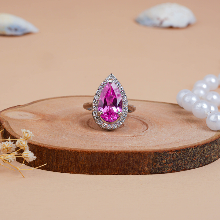 Pear Cut Halo Pink Sapphire & Engagement Diamond Ring