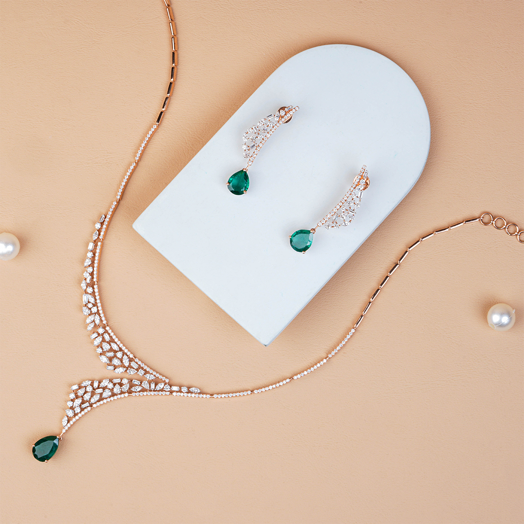 The Emerald Pear Grandeur Necklace with Multi-Cut Diamond Detailing